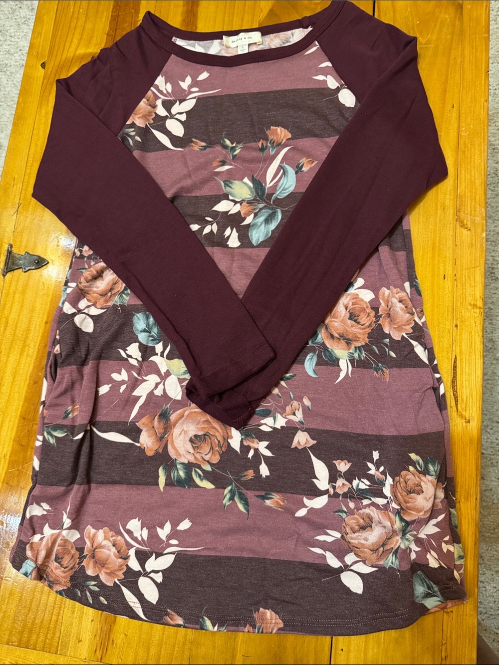 Hailey & Co dress size small.  Pockets on each side.  Color is burgundy